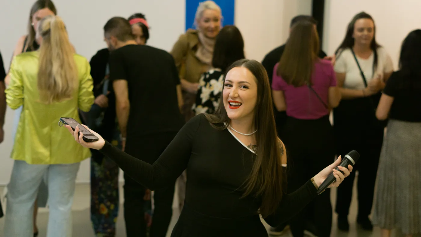 Elsi with guests at a networking event